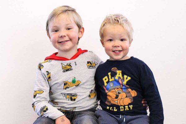 cute professional daycare shot of sibling boys portrait