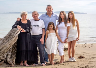 Extend family portrait photography on local Army beach, Auckland New Zealand. Professional Location Photography Session.