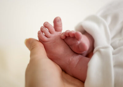 1 week old newborn baby feet photo