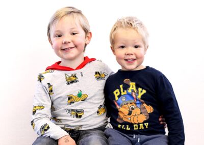 Early Childhood, daycare, preschool professional portraits in Auckland, New Zealand featuring sibling smiling boys