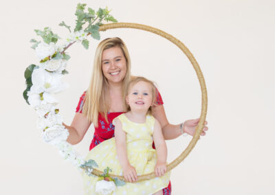 mother and daughter with decorative flowerhoop