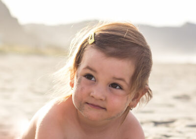 toddler in sunset on the beach