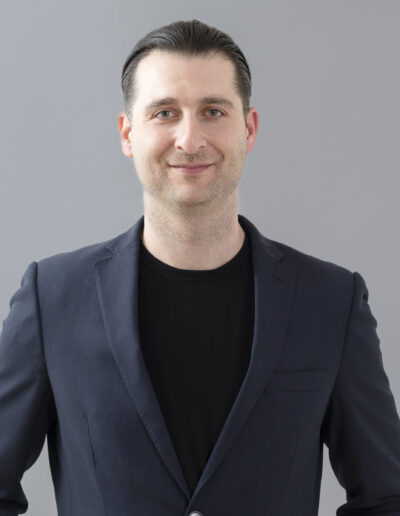 professional headshot with grey background