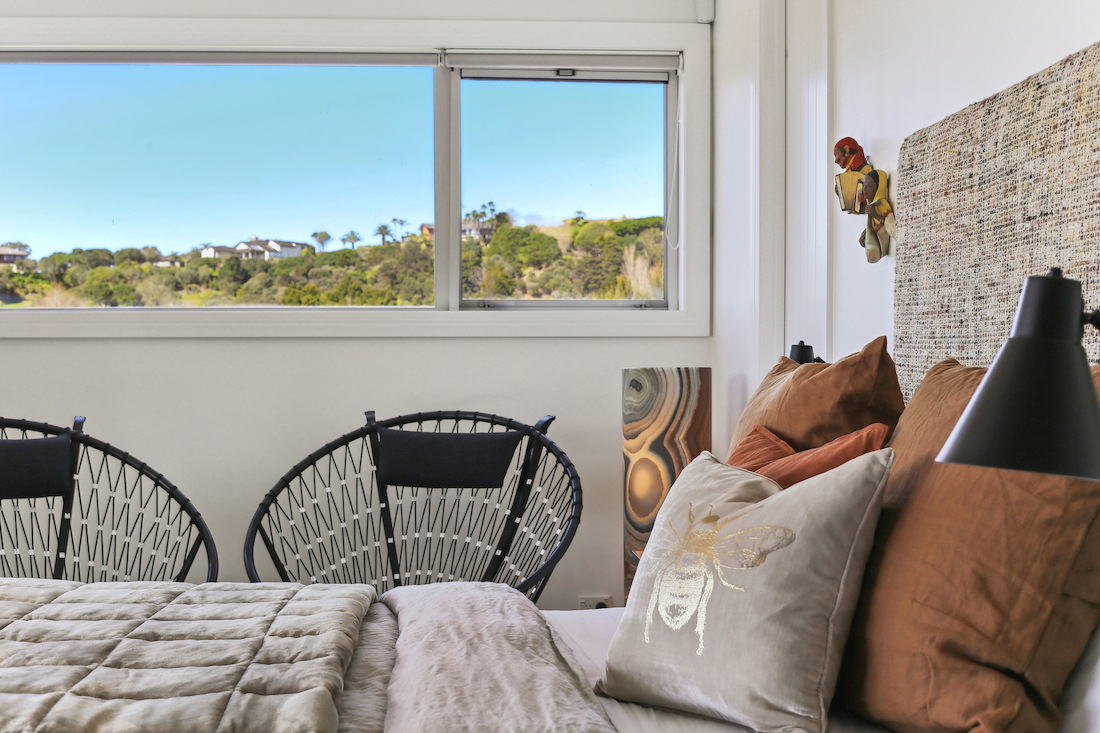 detail shot of interior cushions and blue skies in window
