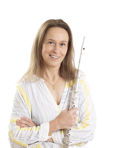 light and airy, yellow and white colours with flute player in action