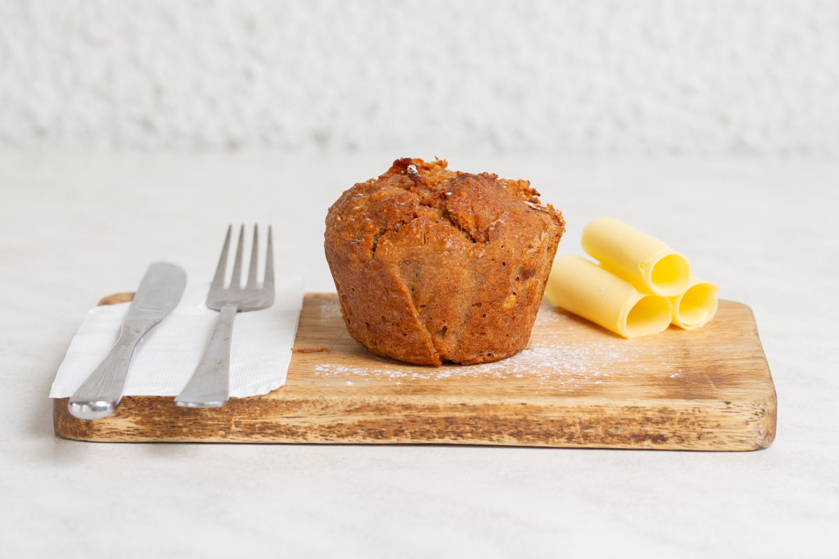 clean white background_muffin with rolled butter food shot
