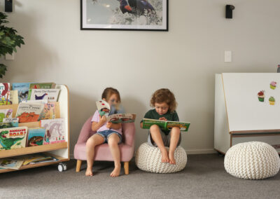 Inside of a daycare, reading children, light and airy high end photography