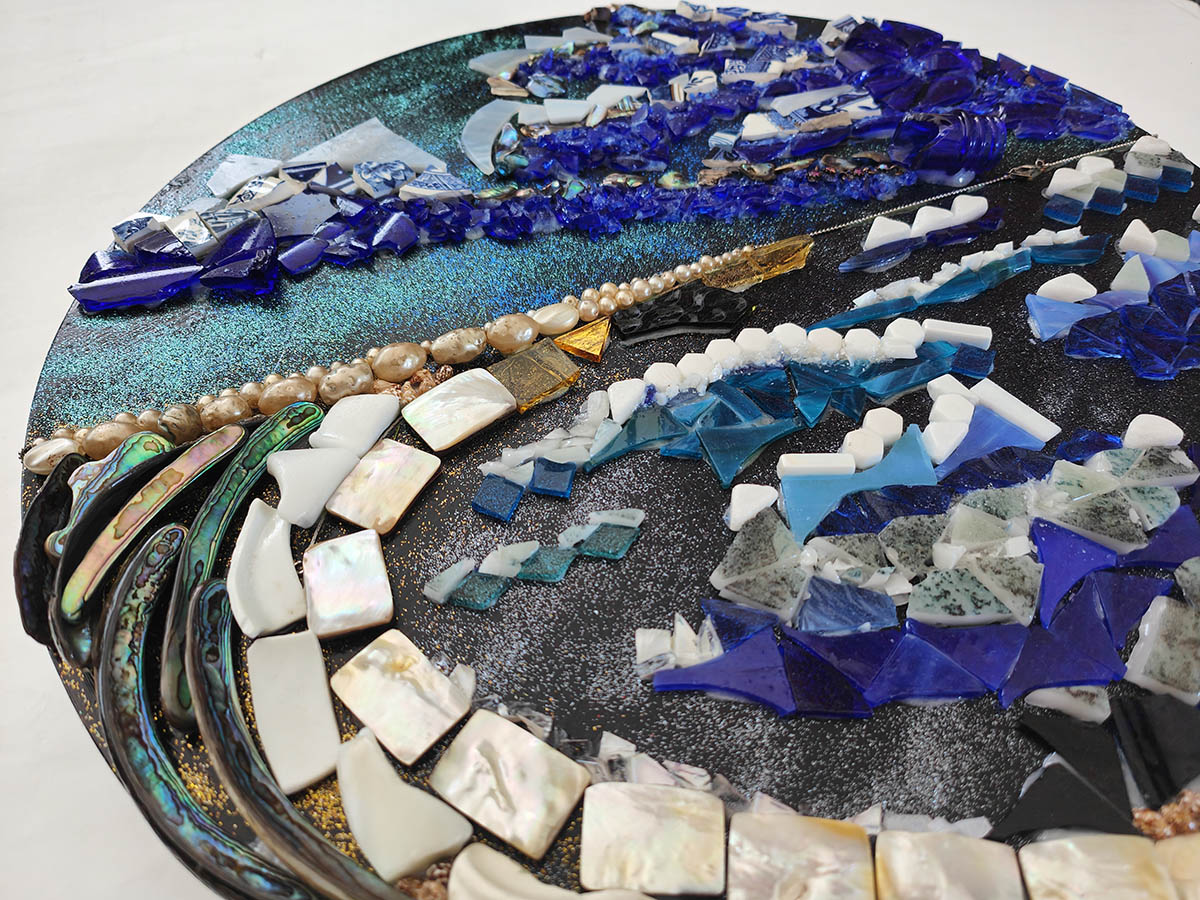 natural mixed media mosaics using shells and rocks in bronze, white and black tones