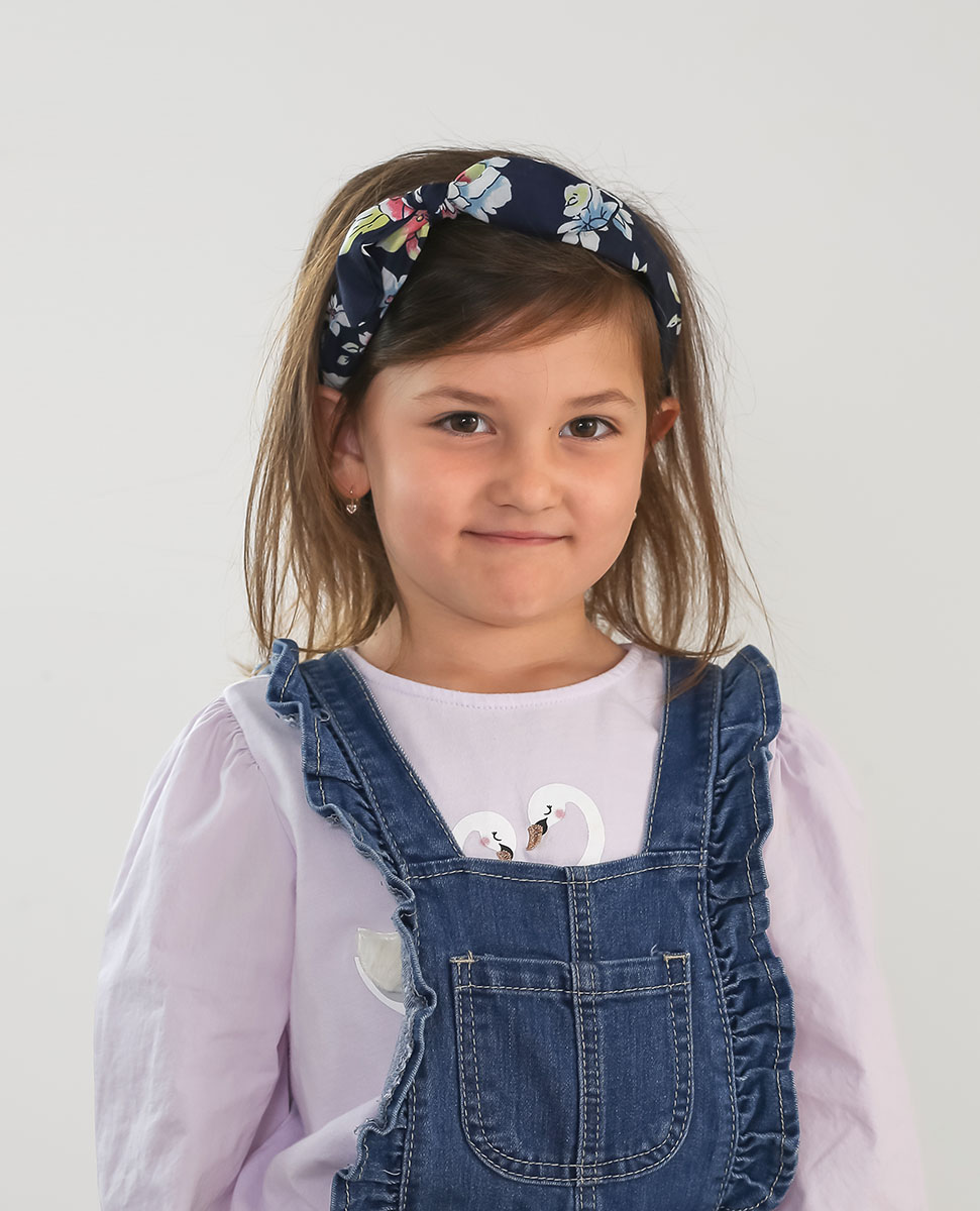 Young Girl traditional portrait ECE photo with white background